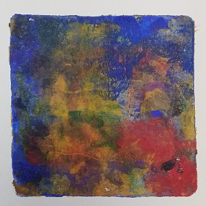 Monotype gel print with blue background overlain with amorphous shapes in red and yellow